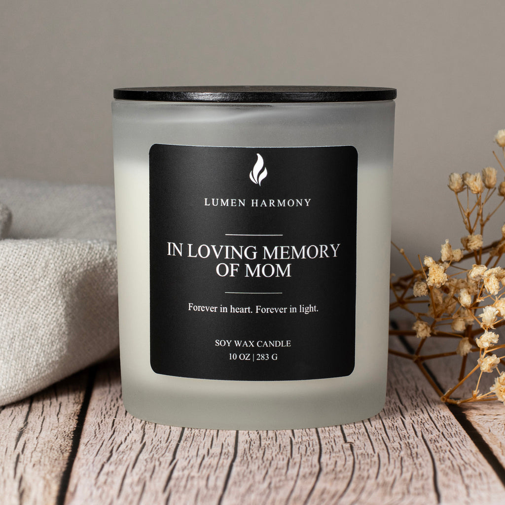 Candle with 'Lumen Harmony' label on a wooden surface