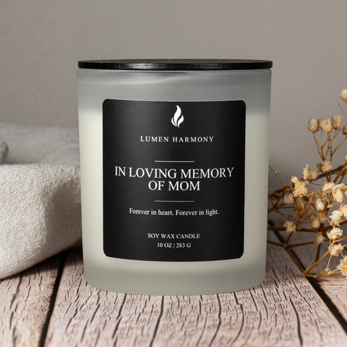 Candle with 'Lumen Harmony' label on a wooden surface